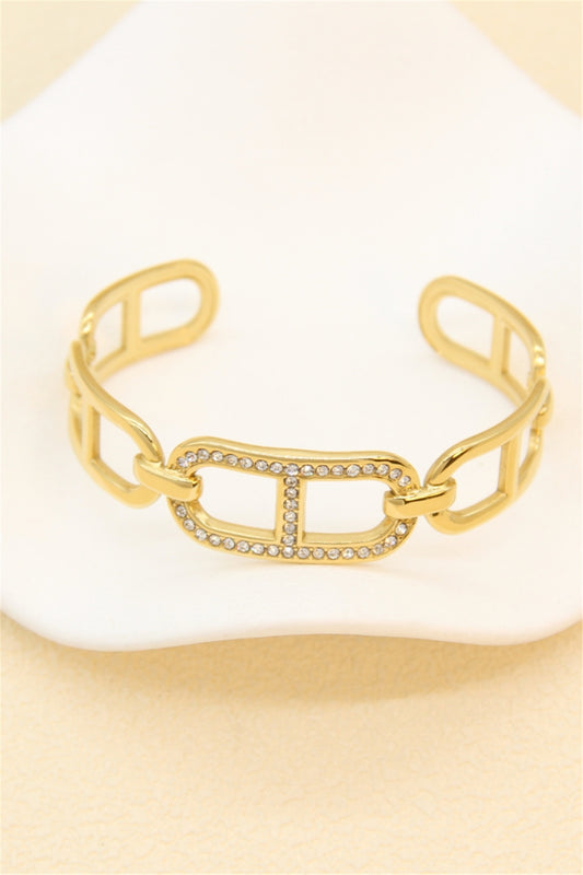 Bracelet Jonc Doré Fleur Strassée – Élégance et Raffinement en Acier Inoxydable